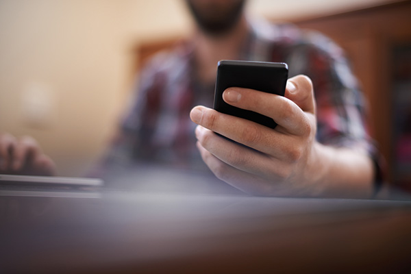 image of a patient receiving a text reminder